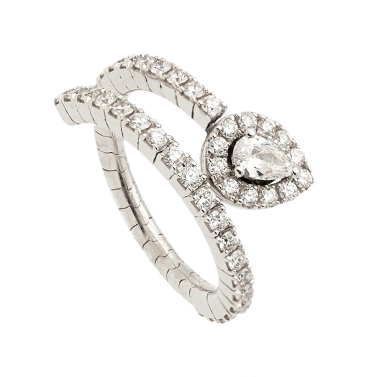 Anillo de oro blanco de 18Kt en forma de espiral de doble vuelta, extensible y articulada, con diamante talla perilla y talla br