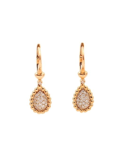 Pendientes largos de oro rosa de 18Kt con un pequeño corazón del que cuelga un diamante talla brillante y un motivo en forma de 