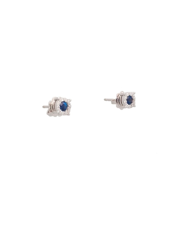 Pendientes de oro blanco de 18Kt, con zafiros redondos con un peso de 0,35ct rodeados de una orla de diamantes talla brillante c