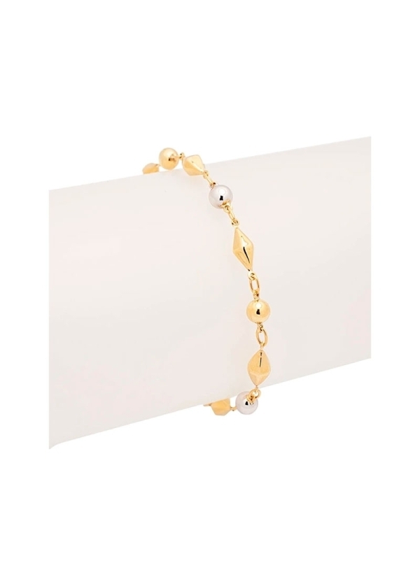 Pulsera de oro bicolor de 18Kt, formada por figuras octaédricas de color amarillo y esferas de color blanco y amarillo, unidas p