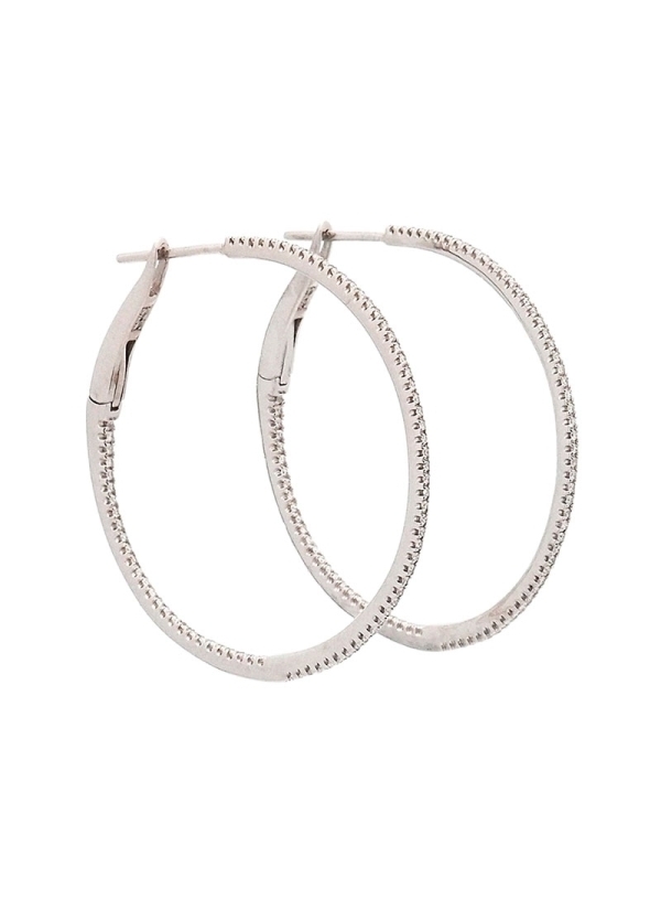 Pendientes de oro blanco de 18Kt en forma de finas criollas redondas de 32mm de diámetro formadas por diamantes talla brillante.