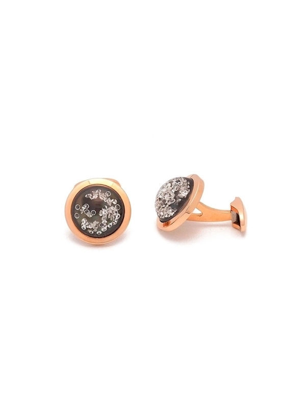 Gemelos de oro rosa de 18Kt con placa de nácar cubierta por cuarzo hialino y relleno de un gel en donde flota 1,00ct de diamante