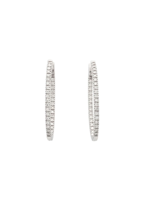Criollas de oro blanco de 18Kt, de forma oval con 27mm de frente, de diamantes talla brillante, también presenta brillantes enga