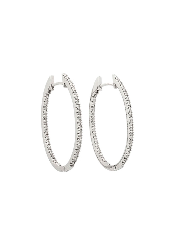 Criollas de oro blanco de 18Kt, de forma oval con 27mm de frente, de diamantes talla brillante, también presenta brillantes enga