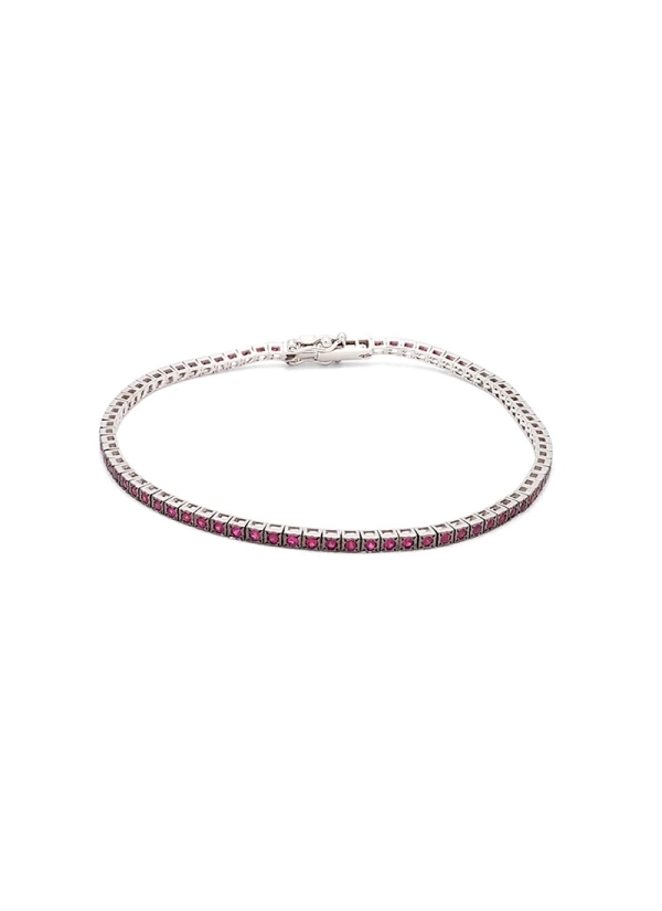 Pulsera de oro blanco de 18Kt, con el frente pavonado en negro, tipo riviere con 76 rubíes de talla redonda con un peso total de
