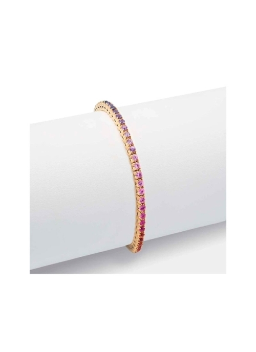 Pulsera de oro amarillo de 18Kt,elástica, mediante un hilo interior de titanio. Lleva engastados en garras, zafiros redondos de 