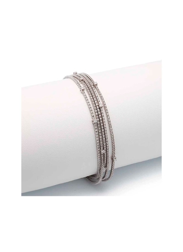 Pulsera de oro blanco de 18Kt compuesta por cinco bandas de diamantes talla brillante de pequeño tamaño engastados en garras, co
