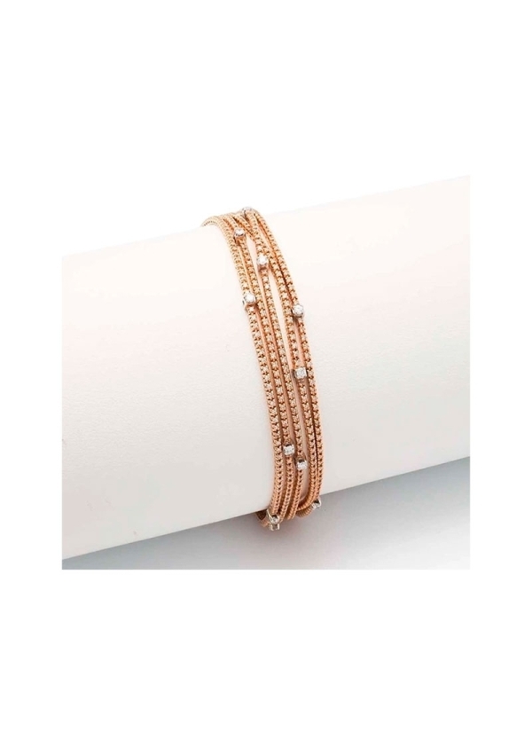Pulsera de oro rosa de 18Kt compuestas por cinco bandas de diamantes talla brillante de pequeño tamaño engastados en garras, con