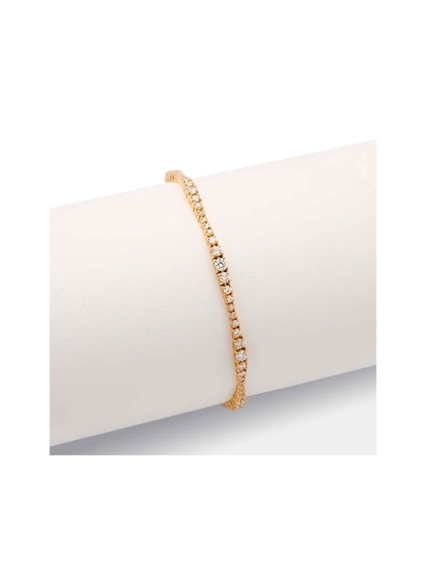 Pulsera de oro amarillo de 18Kt de aspecto ondulante al llevar diamantes talla brillante, engastados en garras y en grupos de di