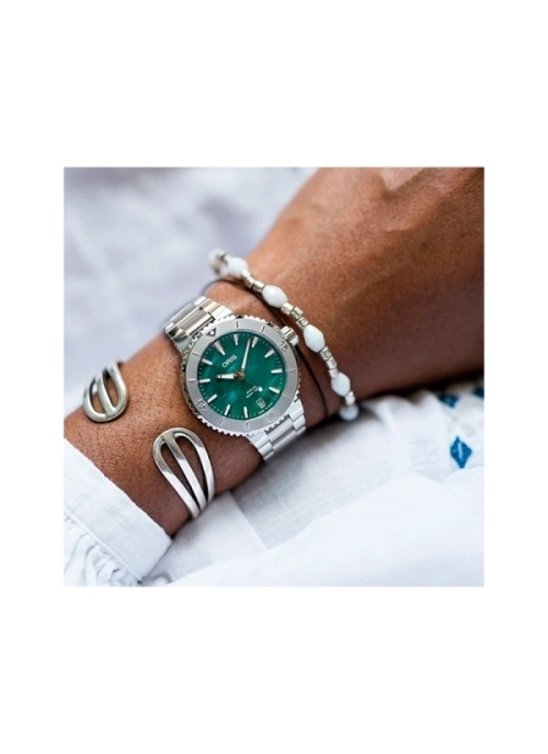 Reloj automático con reserva de marcha de hasta 38h, caja de acero de 36,50 mm, esfera azul con ventana de fecha con pulsera met