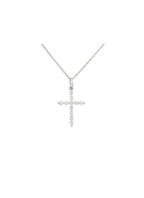 Cruz de oro blanco de 18Kt de contorno inusual, formada por 11 diamantes talla brillante con un peso total de 0,23ct y calidad d