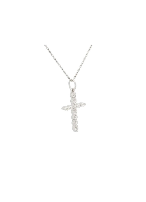 Cruz de oro blanco de 18Kt de contorno inusual, formada por 11 diamantes talla brillante con un peso total de 0,23ct y calidad d