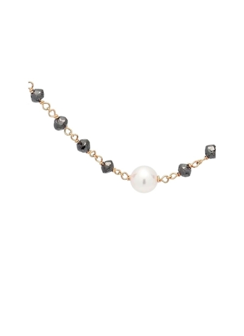 Cadena de oro rosa de 18Kt y 45cm de largo, que lleva entorchada en ella 63 rondelles de diamante negro, con un peso total de 9,