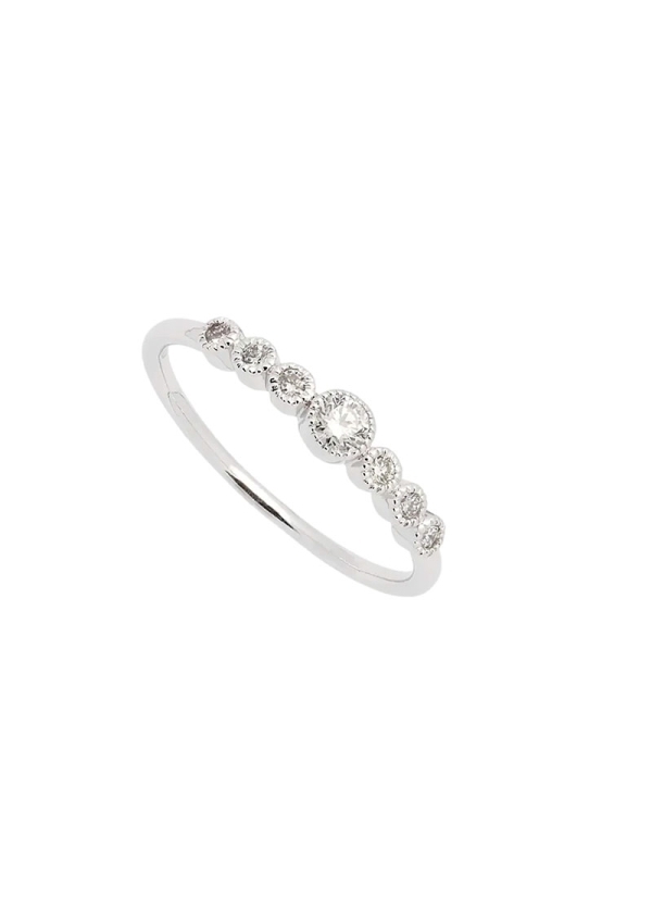 Ligero anillo de oro blanco de 18Kt con diamantes talla brillante con un peso total de 0,17ct y calidad G-VS con uno de mayor ta