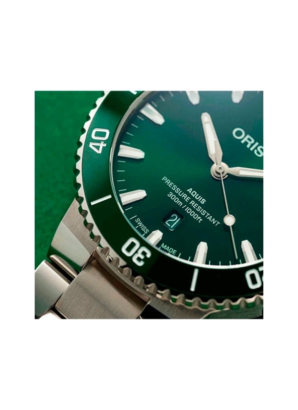 Reloj automático con reserva de marcha de hasta 38h, caja de acero de 43,50 mm, esfera verde con ventana de fecha y correa de ac 2