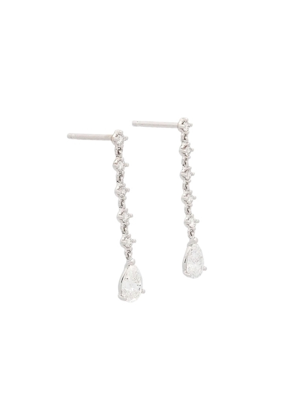 Finos pendientes de oro blanco de 18Kt, con 5 diamantes talla brillante engastados en garras, unidos por pequeñas asas que le da