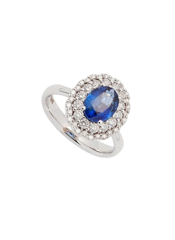 Anillo de oro blanco de 18Kt con un zafiro talla oval con un peso de 1,58ct, rodeado por una doble orla (14 y 28) de diamantes t