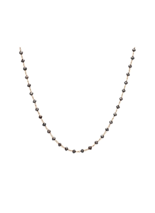 Cadena de oro rosa de 18Kt que en todo su largo lleva entorchados 59 rondeles de diamante negro. Mediante asas, al final, puede 