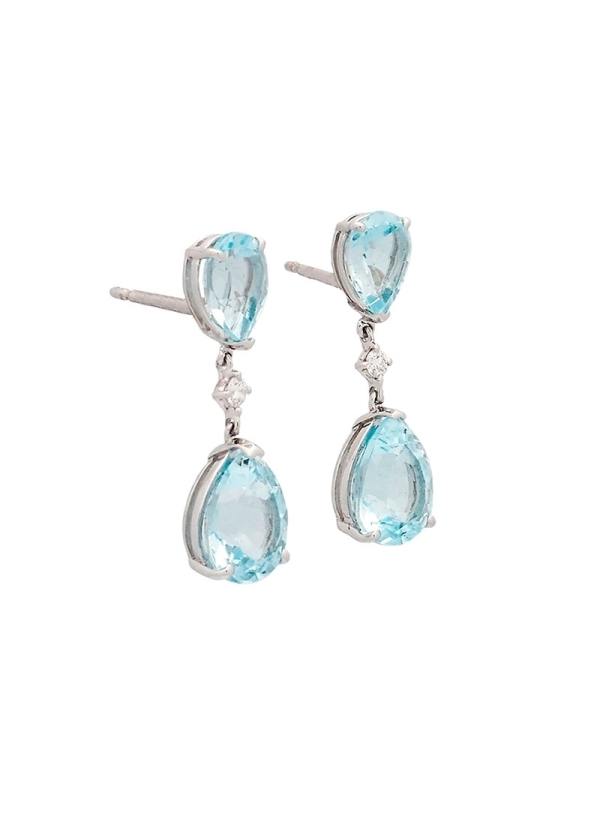 Pendientes de oro blanco de 18Kt con dos topacios sky de talla perilla enfrentados y nidos mediante un diamante talla brillante 