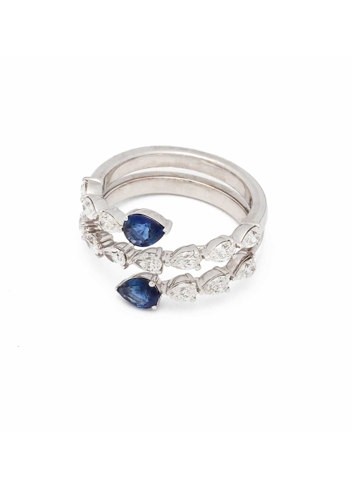 Anillo envolvente de oro blanco de 18Kt, compuesto por 13 diamantes talla perilla de calidad G VS con un peso total de 1,00ct y 