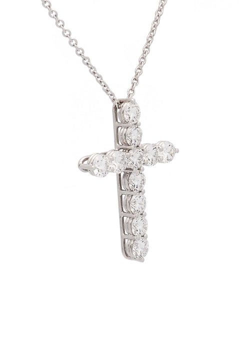 Cadena de oro blanco de 18Kt de 43cm de largo, con asa extra, permitiendo una medida de 40cm, con una cruz de oro blanco de 18Kt