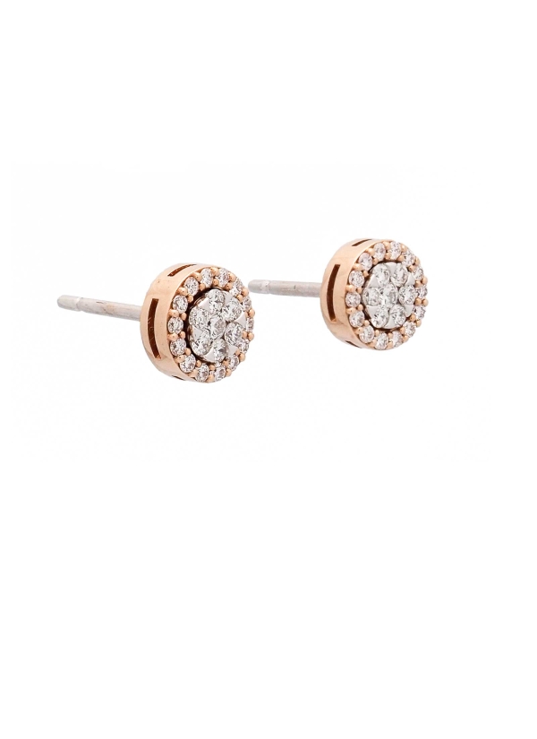 Pequeños pendientes de oro blanco y rosa de 18Kt, desmontables. Compuestos por un centro redondo de oro blanco con diamantes tal 2