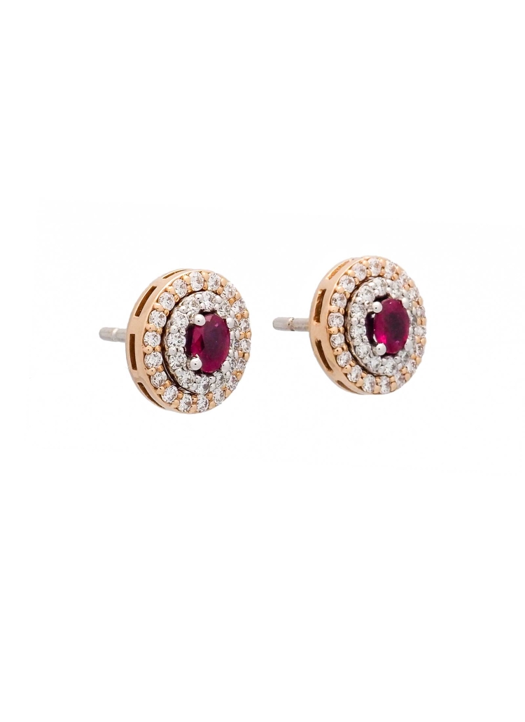 Pendientes desmontables de oro rosa y oro blanco de 18Kt, de forma oval. Estos pendientes están formados por un motivo central (