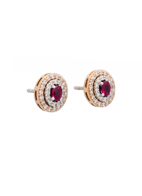 Pendientes desmontables de oro rosa y oro blanco de 18Kt, de forma oval. Estos pendientes están formados por un motivo central (