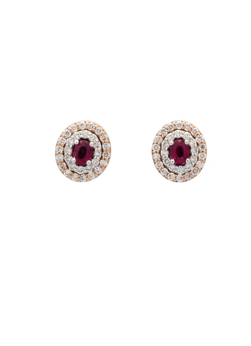 Pendientes desmontables de oro rosa y oro blanco de 18Kt, de forma oval. Estos pendientes están formados por un motivo central (