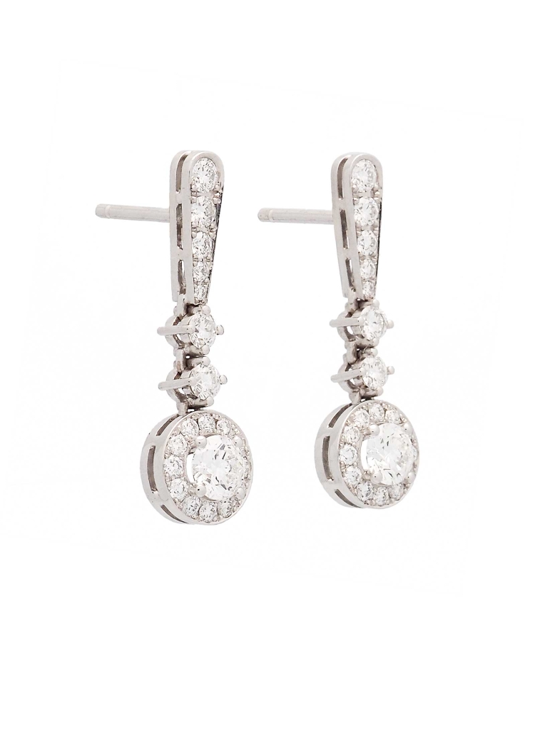 Pendientes de oro blanco de 18Kt, hechos a mano. Gota invertida, unida por 2 garras a una orla con una piedra central montada en
