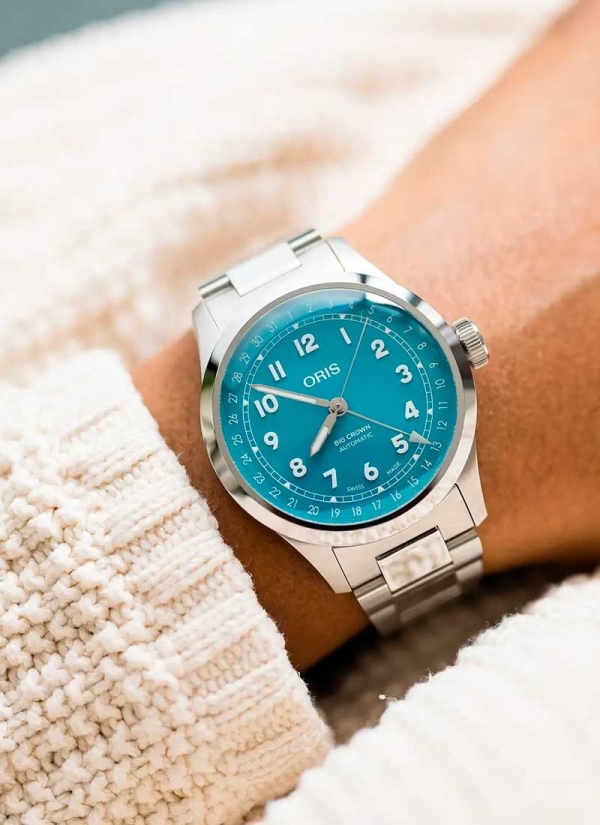 Reloj automático en caja de acero de 40mm con reserva de marcha de hasta 41h, esfera azul turquesa y brazalete de acero. 2