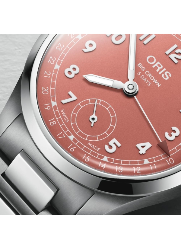 Reloj automático en caja de acero de 40mm con reserva de marcha de hasta 120h, esfera color terracota y brazalete de acero. 2