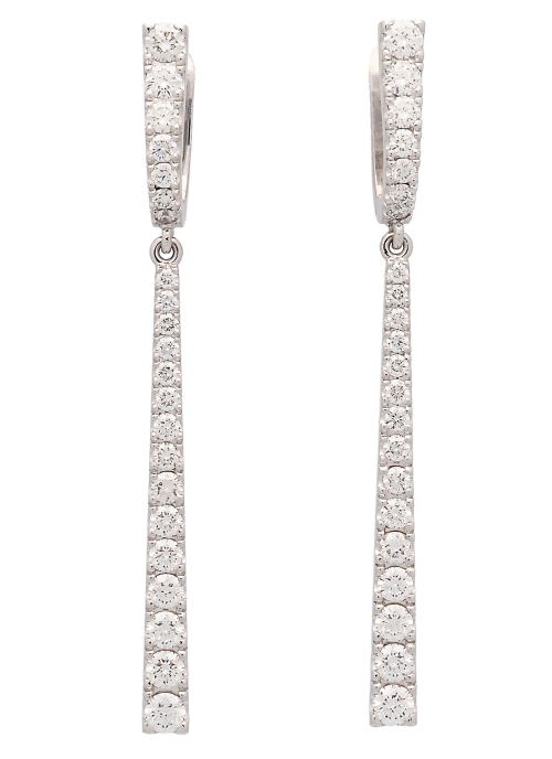 Pendientes de oro blanco de 18Kt, hechos a mano. Dormilonas de 4 garras con un diamante talla brillante de 0,60ct cada uno. Ambo