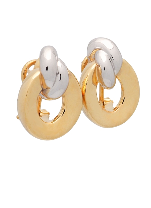 Pendientes huecos de oro de 18Kt. Forma oval de 15mm de largo y oro amarillo, con 2 pequeñas bandas de oro blanco. Con cierre om