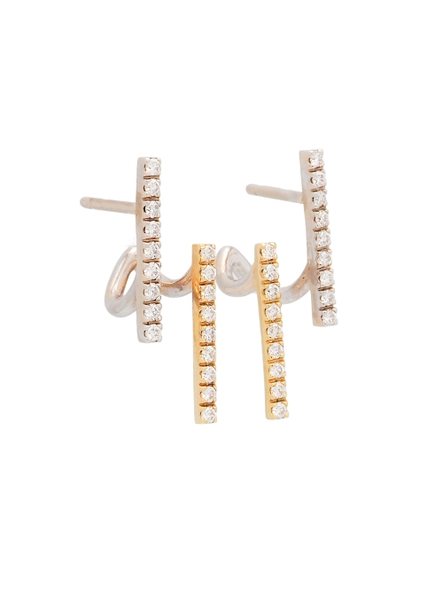 Originales pendientes de oro bicolor de 18Kt, en donde 2 barritas con diamantes talla brillante (0,30ct G VS) parecen flotar en 