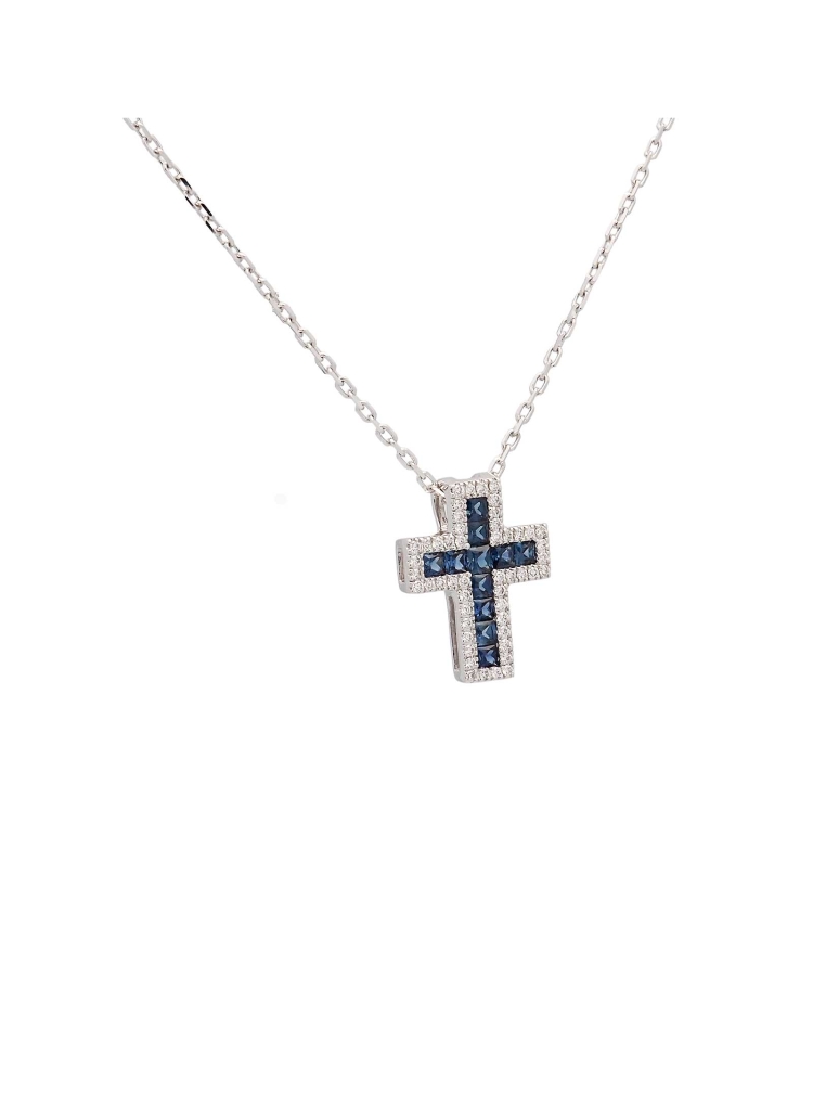Cruz de oro blanco de 18Kt, de 12x10mm (ancho 3,60mm) con zafiros talla carré en el centro, con un peso total de 0,31ct rodeados