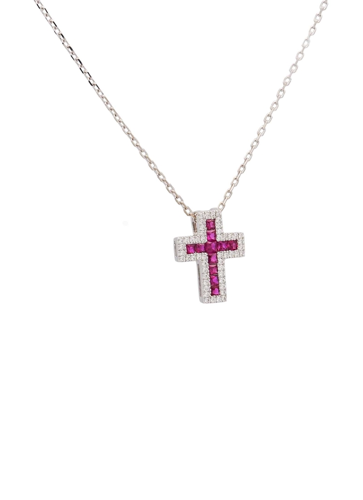 Cruz de oro blanco de 18Kt, de 12x10mm (ancho 3,60mm) con rubíes talla carré en el centro, con un peso total de 0,31ct rodeados 