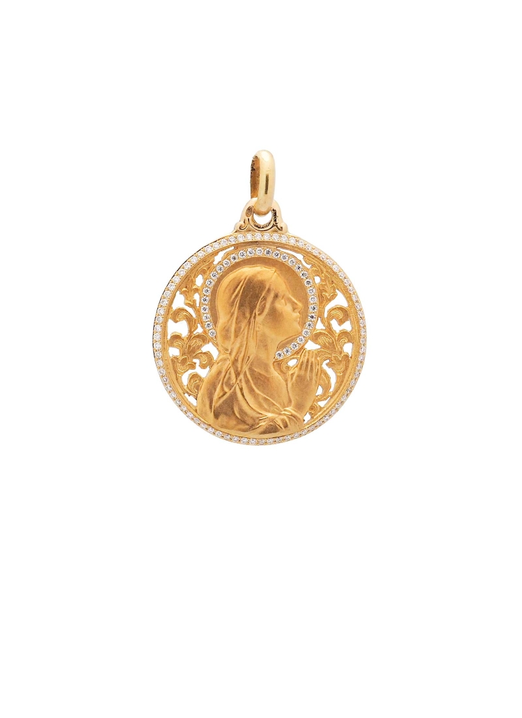 Medalla de oro amarillo de 18Kt. Virgen niña rezando, en medalla calada, con ramas. Lleva diamantes talla brillante de color E/F