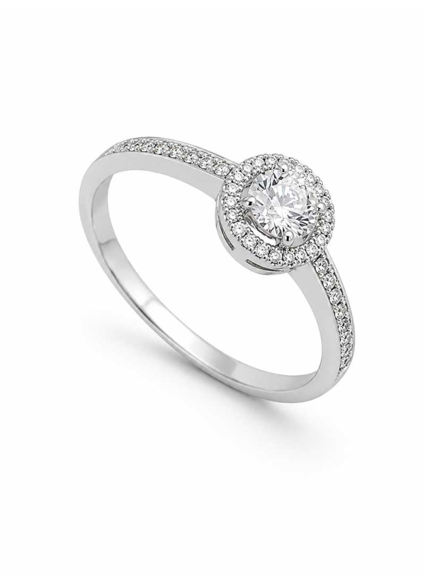 Anillo de oro blanco de 18Kt con un brillante central de 0,25ct engastado en garras. Pequeños brillantes en orla y en brazo, est