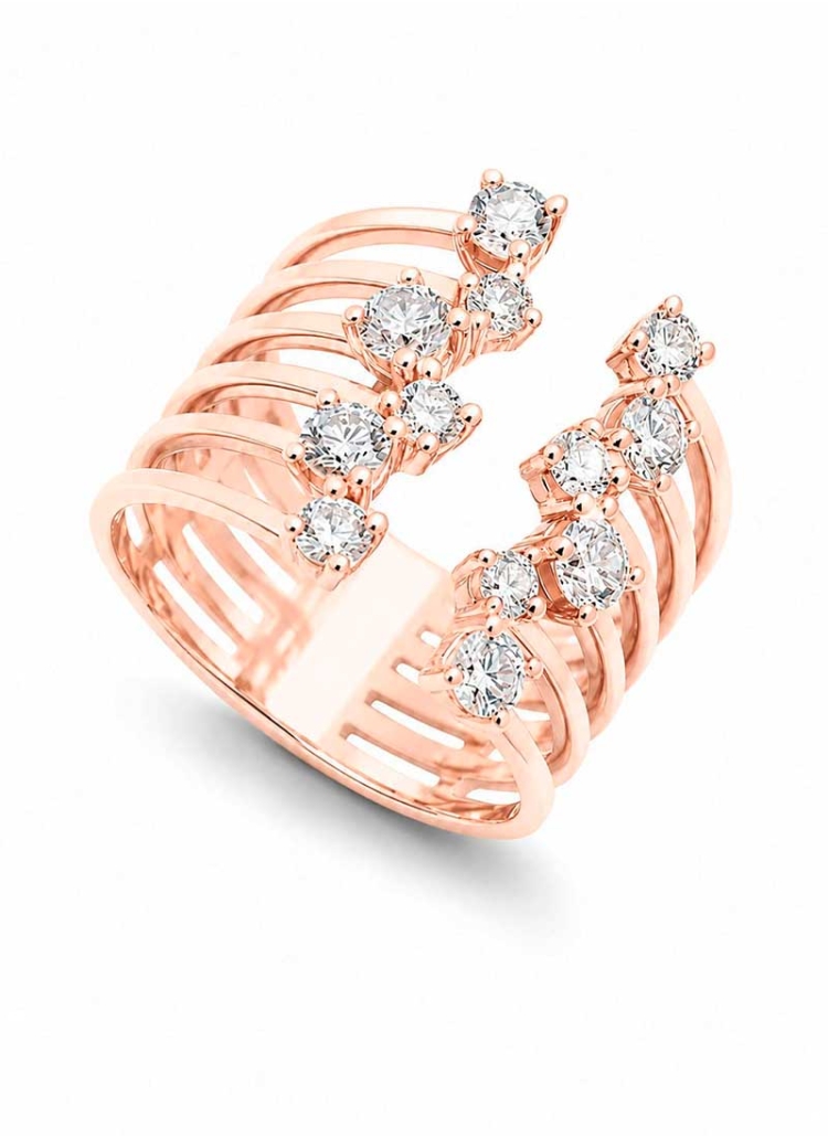 Anillo ancho de oro rosa de 18Kt, en forma de 6 hilos que en sus extremos llevan un diamante talla brillante de distintos tamaño