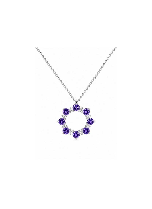Cadena con colgante de oro blanco de 18Kt. El colgante circular lleva 8 tanzanitas talla redonda con un peso total de 1,58ct. En