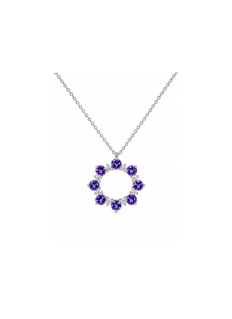 Cadena con colgante de oro blanco de 18Kt. El colgante circular lleva 8 tanzanitas talla redonda con un peso total de 1,58ct. En